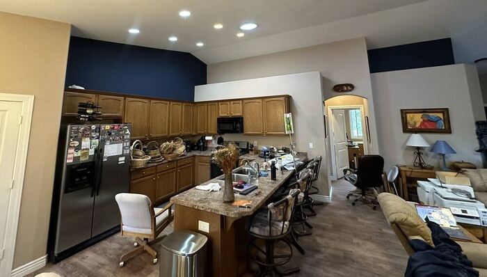 Kitchen interior repaint with navy blue accent wall, Vancouver WA home